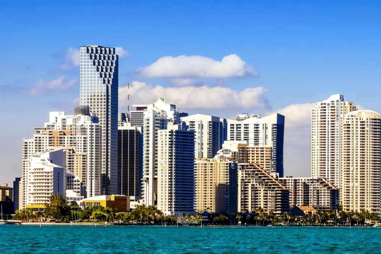 Miami waterfront skyline viewed across Biscayne Bay in clear daylight.